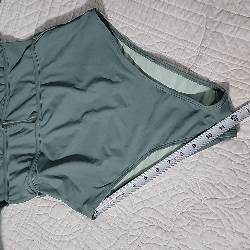 Women's Green One Piece Swimsuit with Unique Cutouts and Structured Bustier - Picture 7 of 11